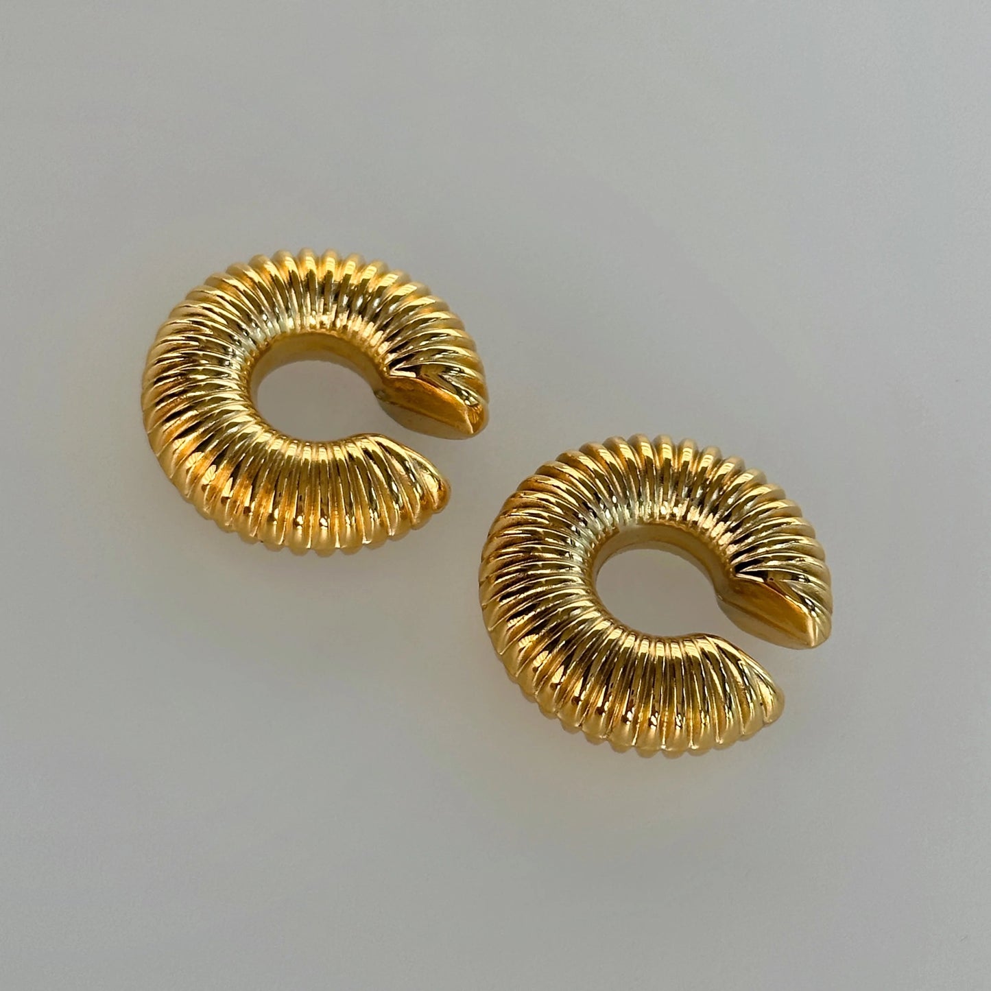 Puño de oreja Coni