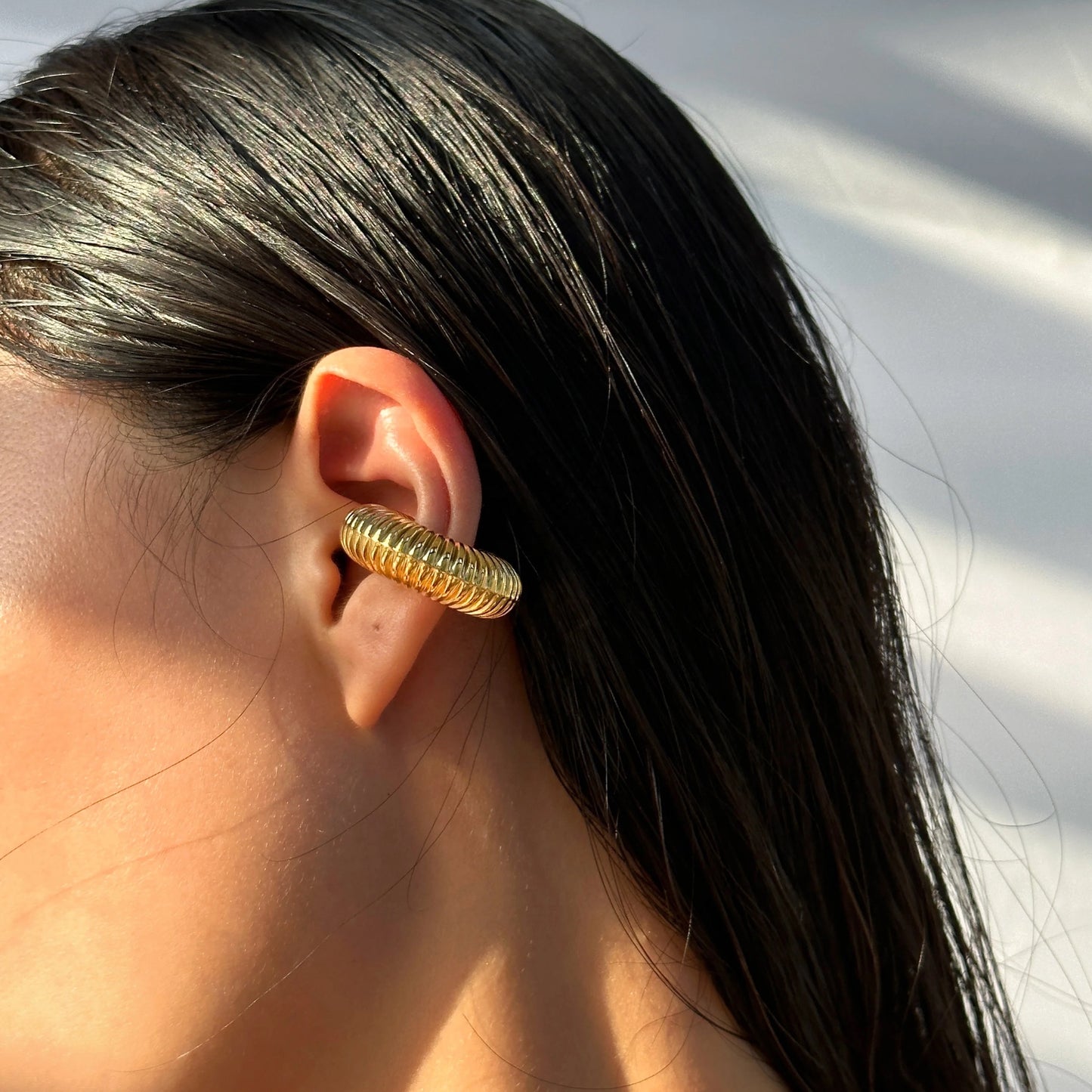 Puño de oreja Coni