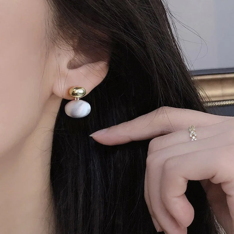 Pendientes Reyna