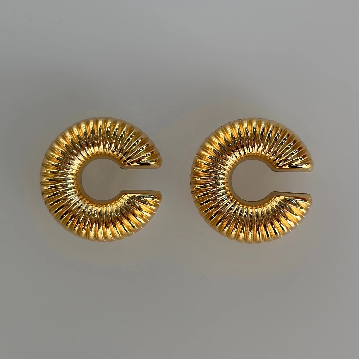 Puño de oreja Coni
